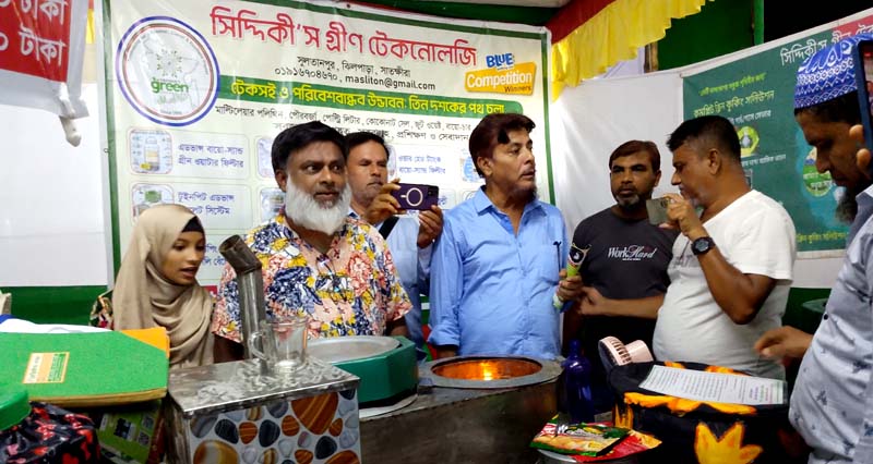 বৃক্ষমেলায় দর্শনার্থীদের দৃষ্টি কাড়ছে ‘সিদ্দিকী’স গ্রীন টেকনোলজির ‘গ্যাস সেভার’ এবং পরিবেশবান্ধব রান্নার উদ্ভাবন